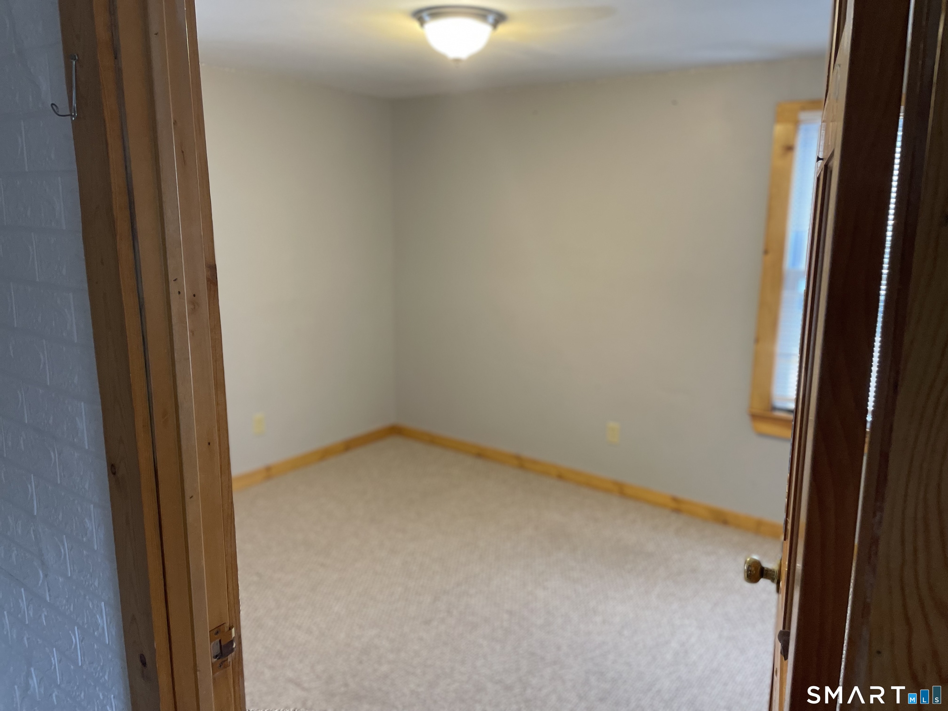 91 Division Street Ansonia, CT 06401 - Photo 9 of 22 a view of empty room