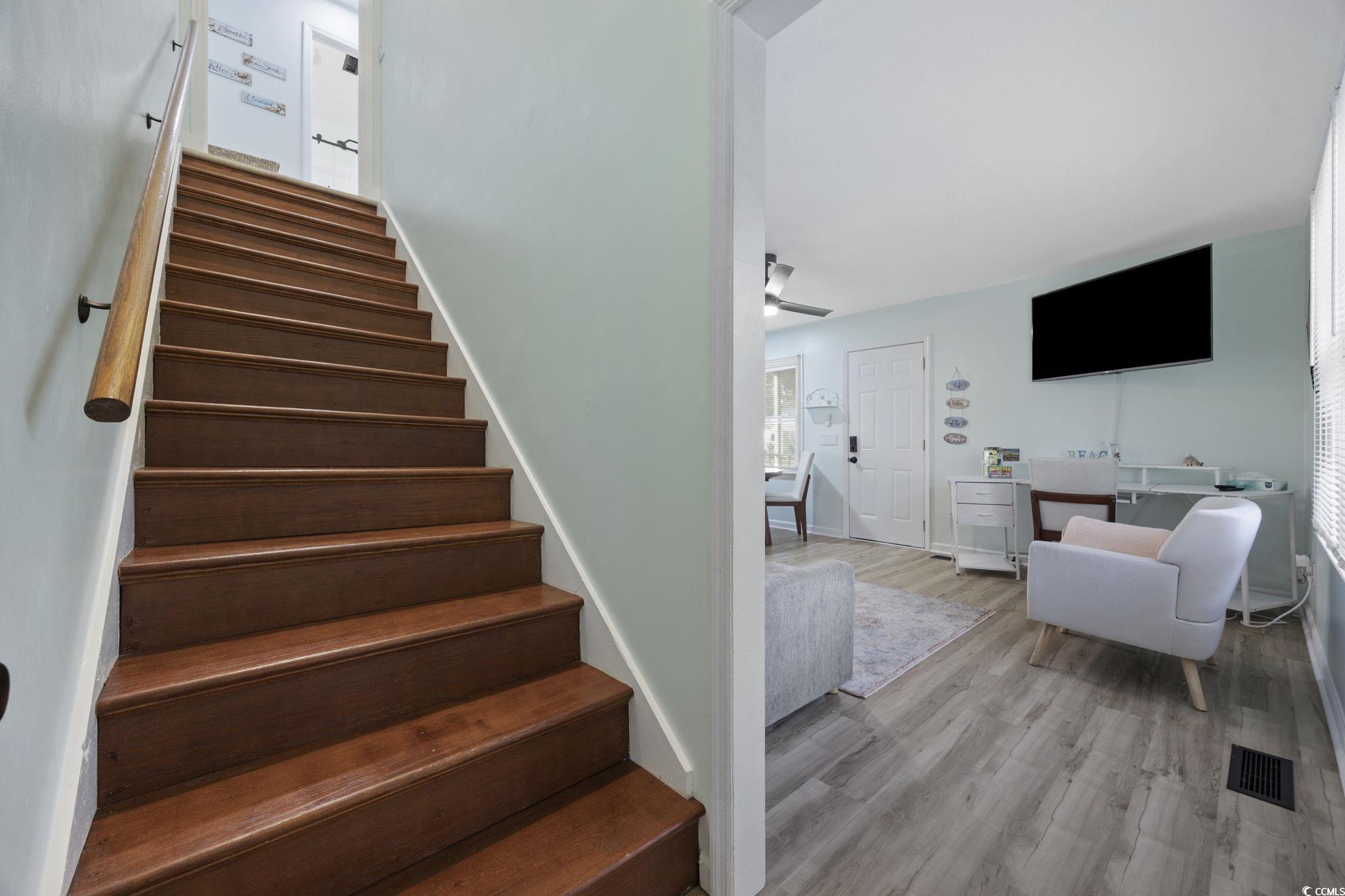 787 Causey Road Murrells Inlet, SC 29576 - Photo 14 of 40 Stairs with wood finished floors