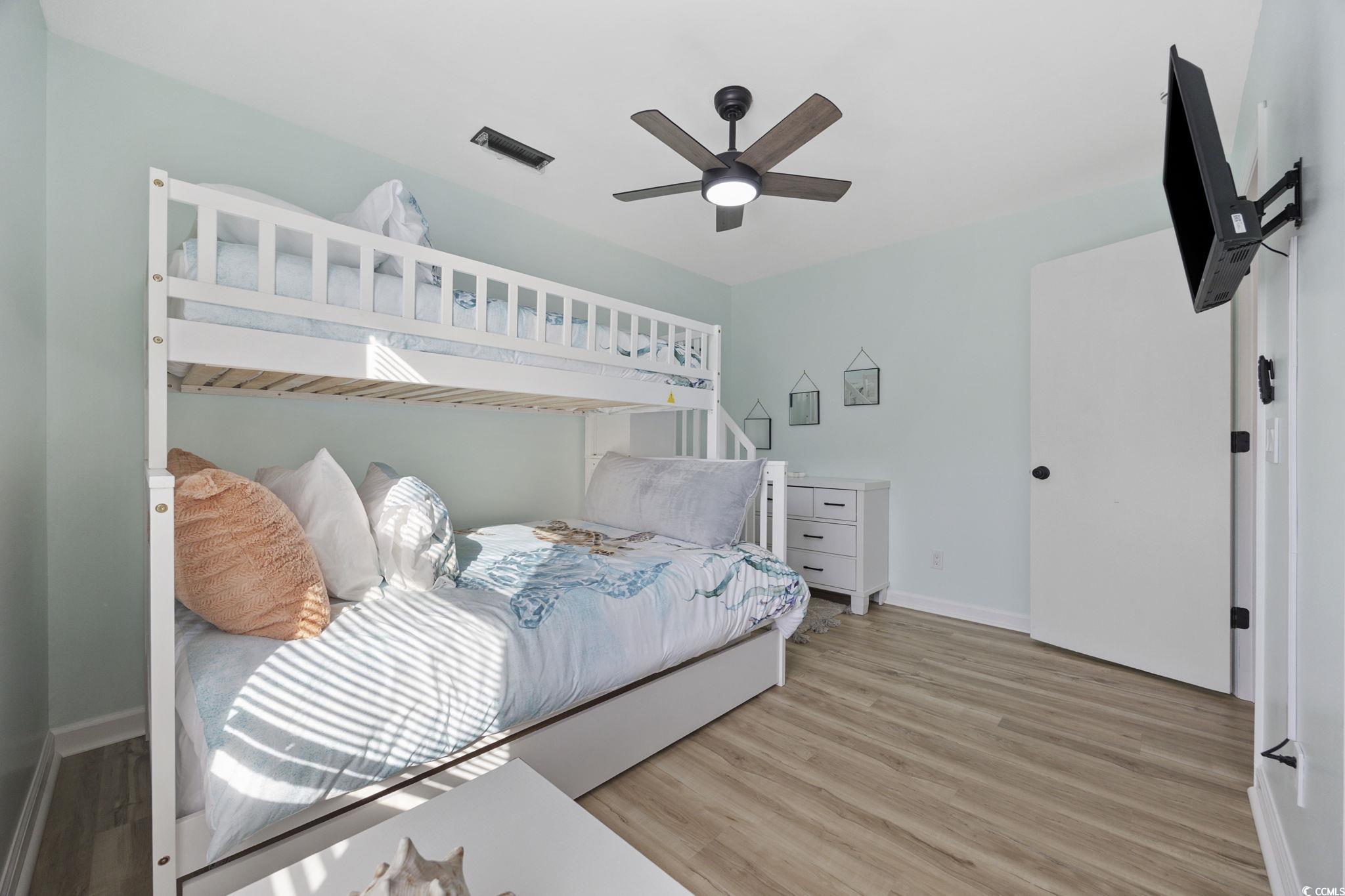 787 Causey Road Murrells Inlet, SC 29576 - Photo 20 of 40 Bedroom with wood finished floors and ceiling fan