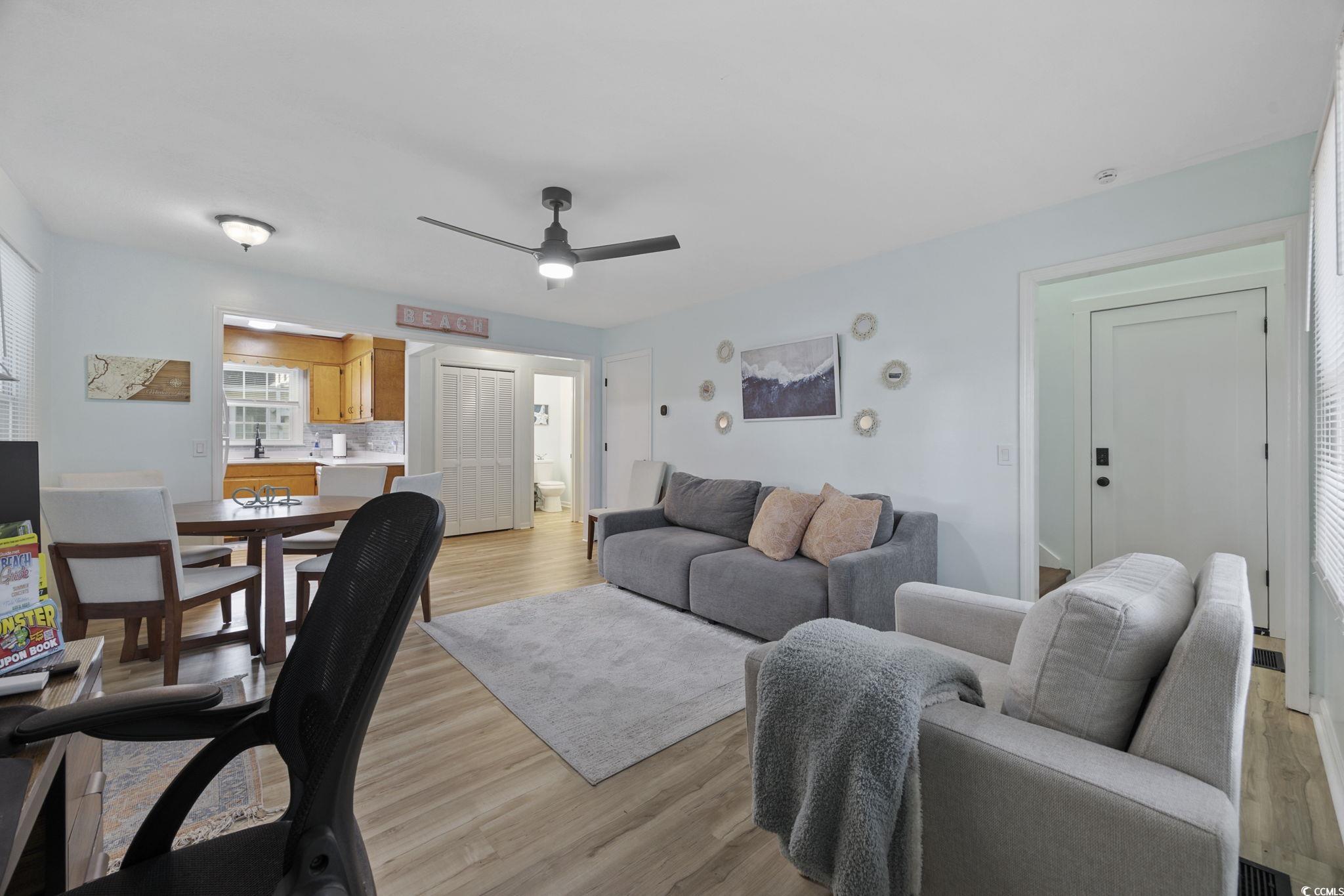 787 Causey Road Murrells Inlet, SC 29576 - Photo 26 of 40 Living room with light wood finished floors and a ceiling fan
