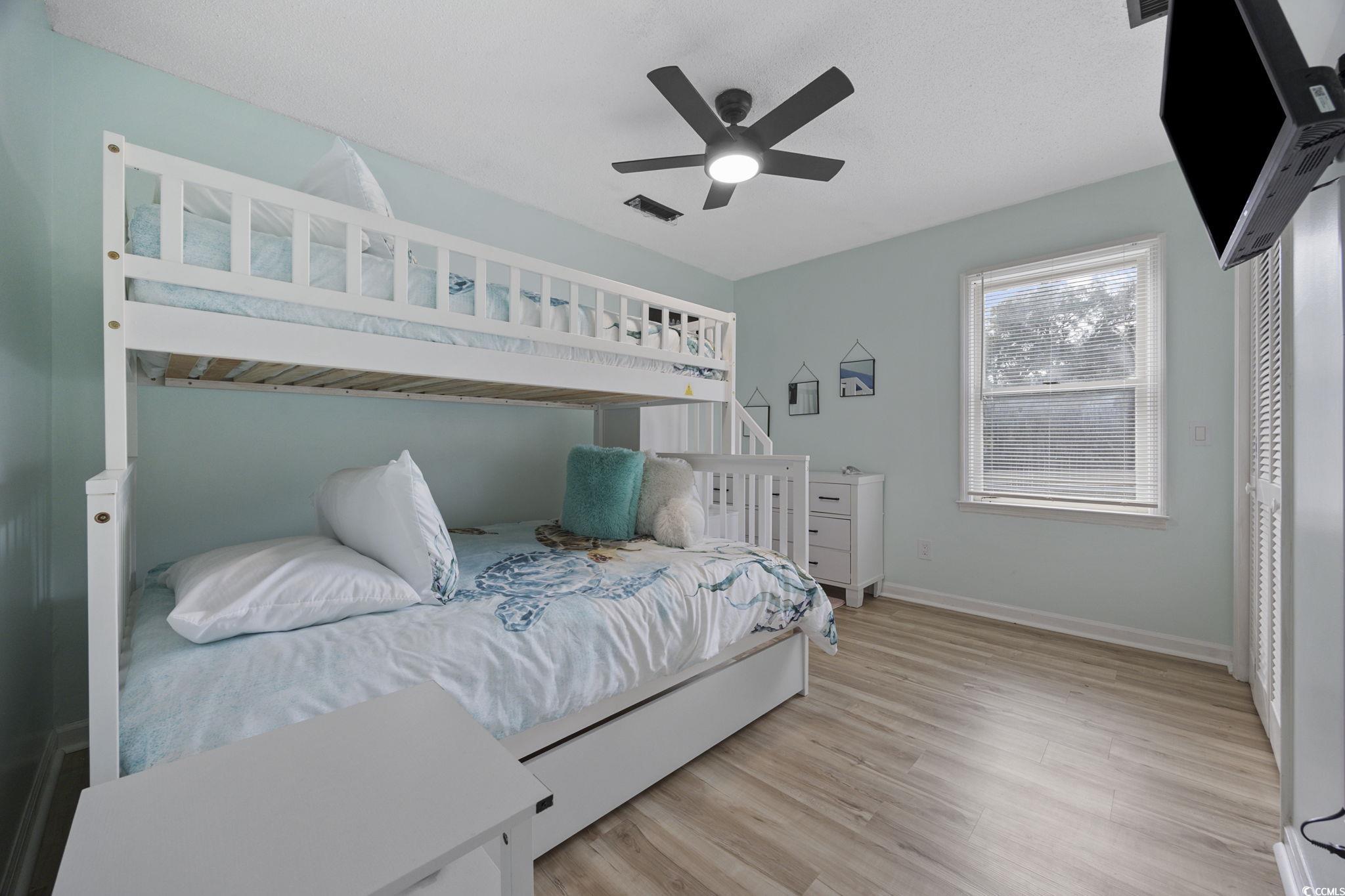 787 Causey Road Murrells Inlet, SC 29576 - Photo 36 of 40 Bedroom featuring light wood-style floors and ceiling fan
