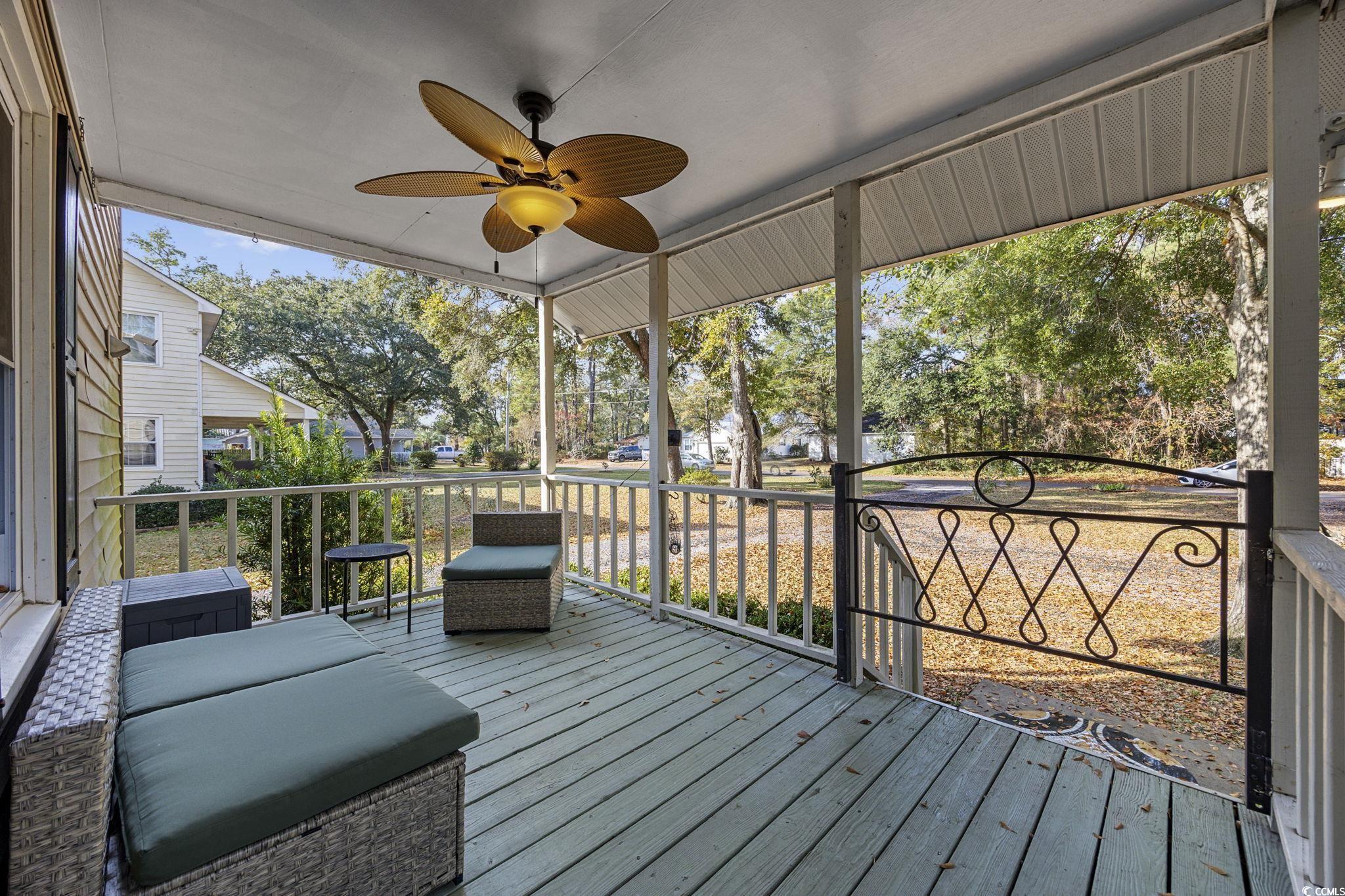 787 Causey Road Murrells Inlet, SC 29576 - Photo 5 of 40 Wooden terrace with ceiling fan