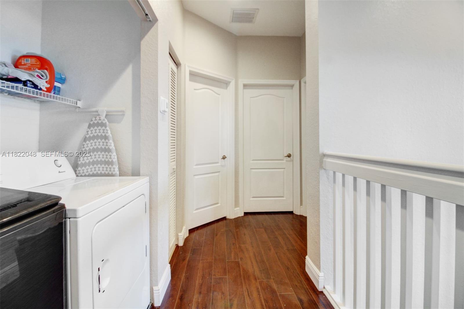 2131 Northeast 37th Road Homestead, FL 33033 - Photo 24 of 34 a view of a storage & utility room with wooden floor