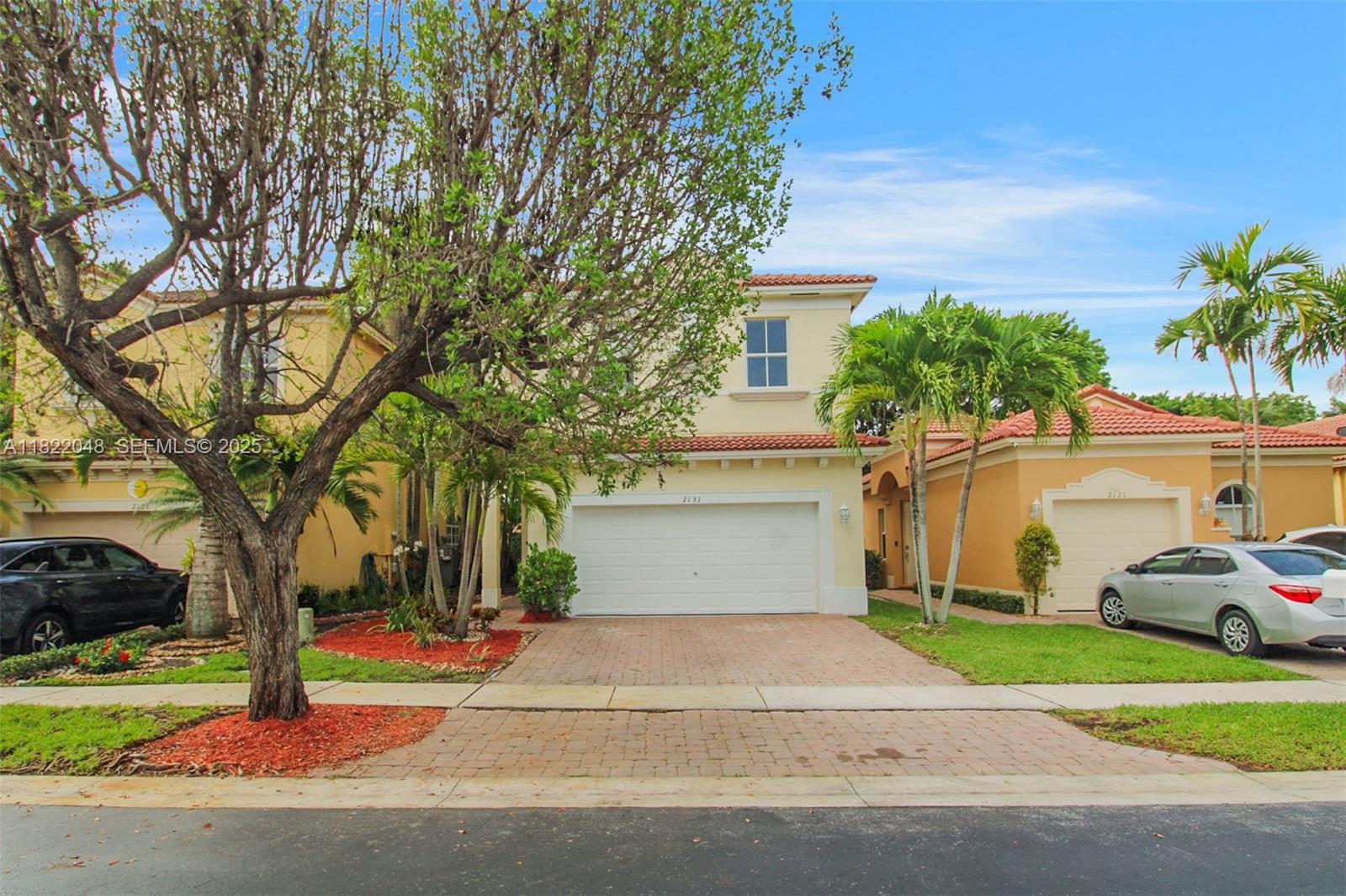2131 Northeast 37th Road Homestead, FL 33033 - Photo 3 of 34 a house view with a garden space