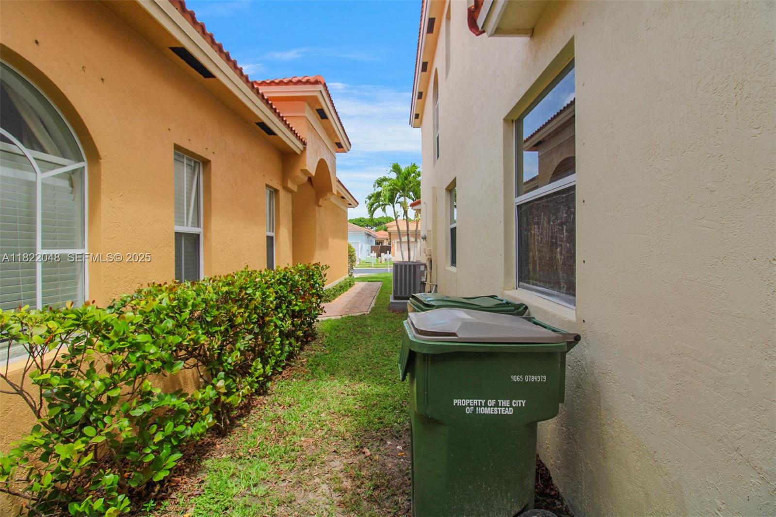 2131 Northeast 37th Road Homestead, FL 33033 - Photo 33 of 34 a bathroom with a sink and mirror