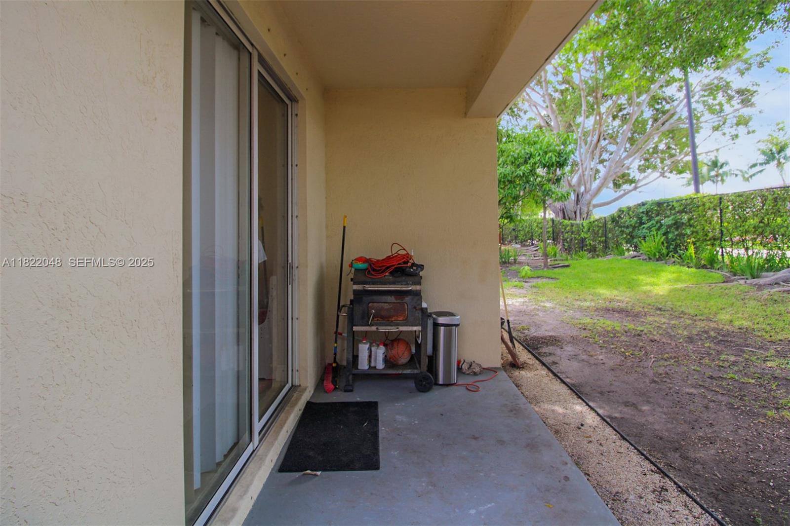 2131 Northeast 37th Road Homestead, FL 33033 - Photo 34 of 34 a backyard of a house with green space