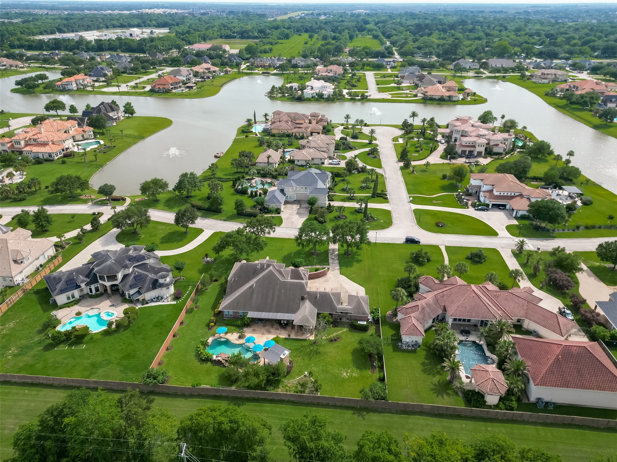 2319 Braer Ridge Drive Katy, TX 77494 - Photo 43 of 50 an aerial view of residential houses with outdoor space and lake view in back
