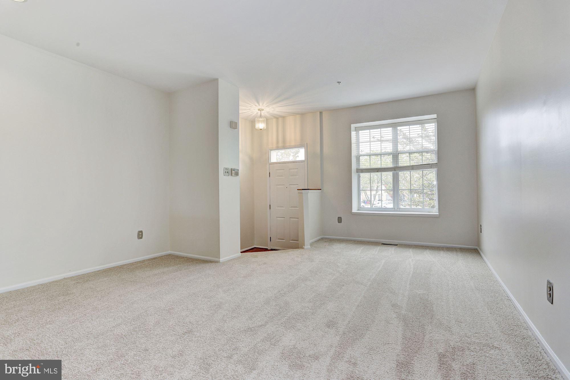 8405 Glad Rivers Row Columbia, MD 21045 - Photo 23 of 27 Open floor plan living & dining rooms