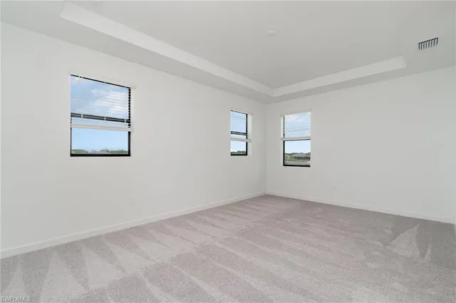 an empty room with a natural light