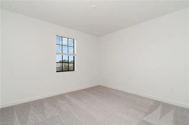 a bathroom with a sink a mirror and a toilet