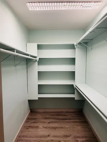 a view of room with walk in closet