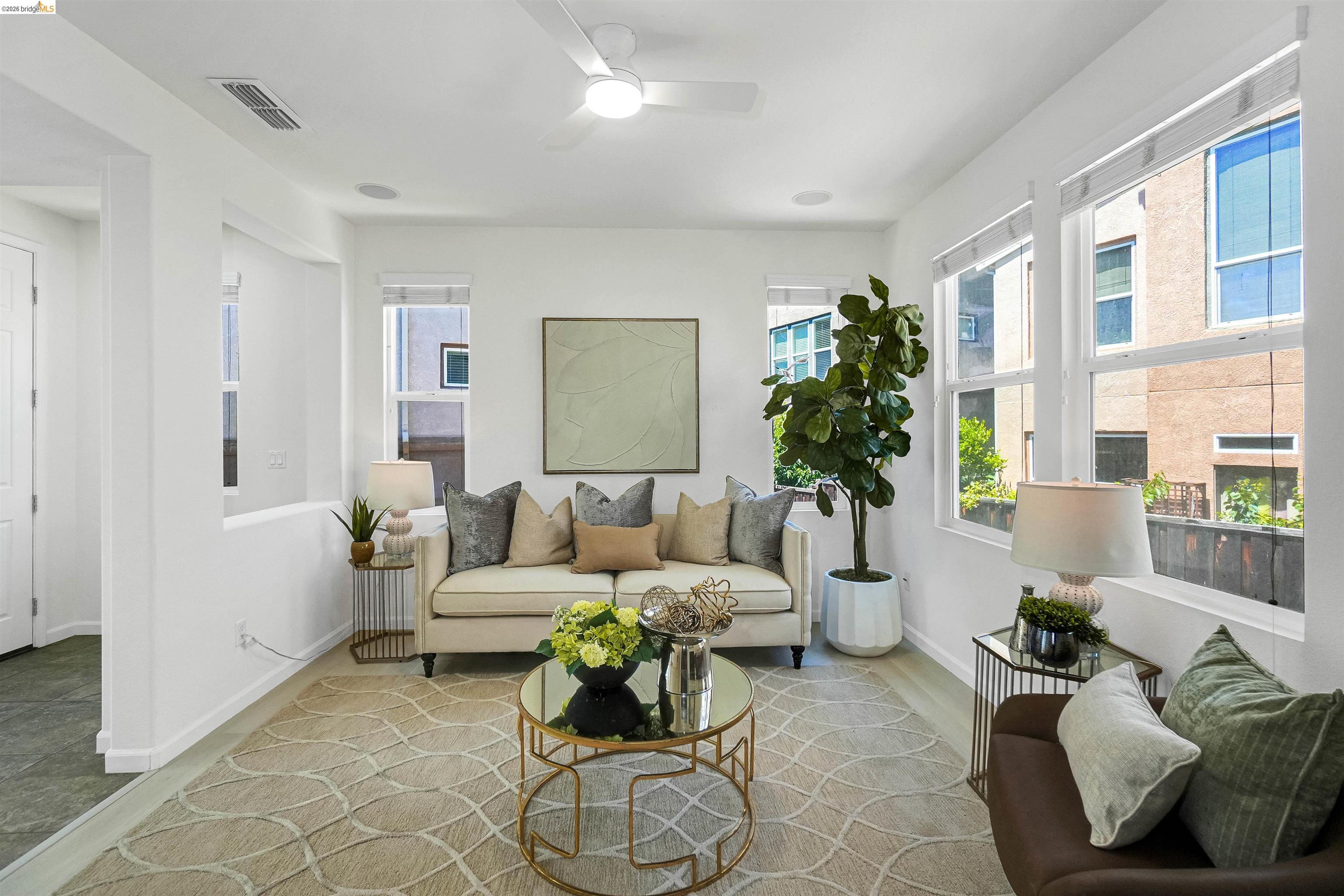 449 Constantine Court San Ramon, CA 94583 - Photo 1 of 63 Living area featuring light wood-finish flooring, white walls, and multiple windows with roller shades