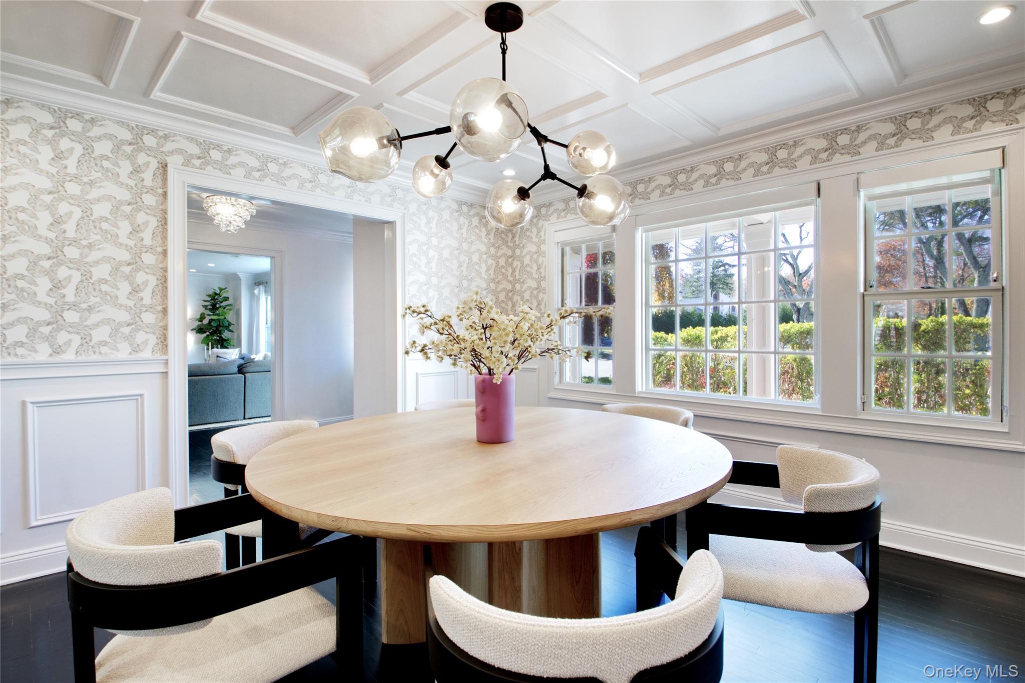6 Flamingo Road East Hills, NY 11576 - Photo 15 of 37 a view of a dining room with furniture wooden floor and chandelier