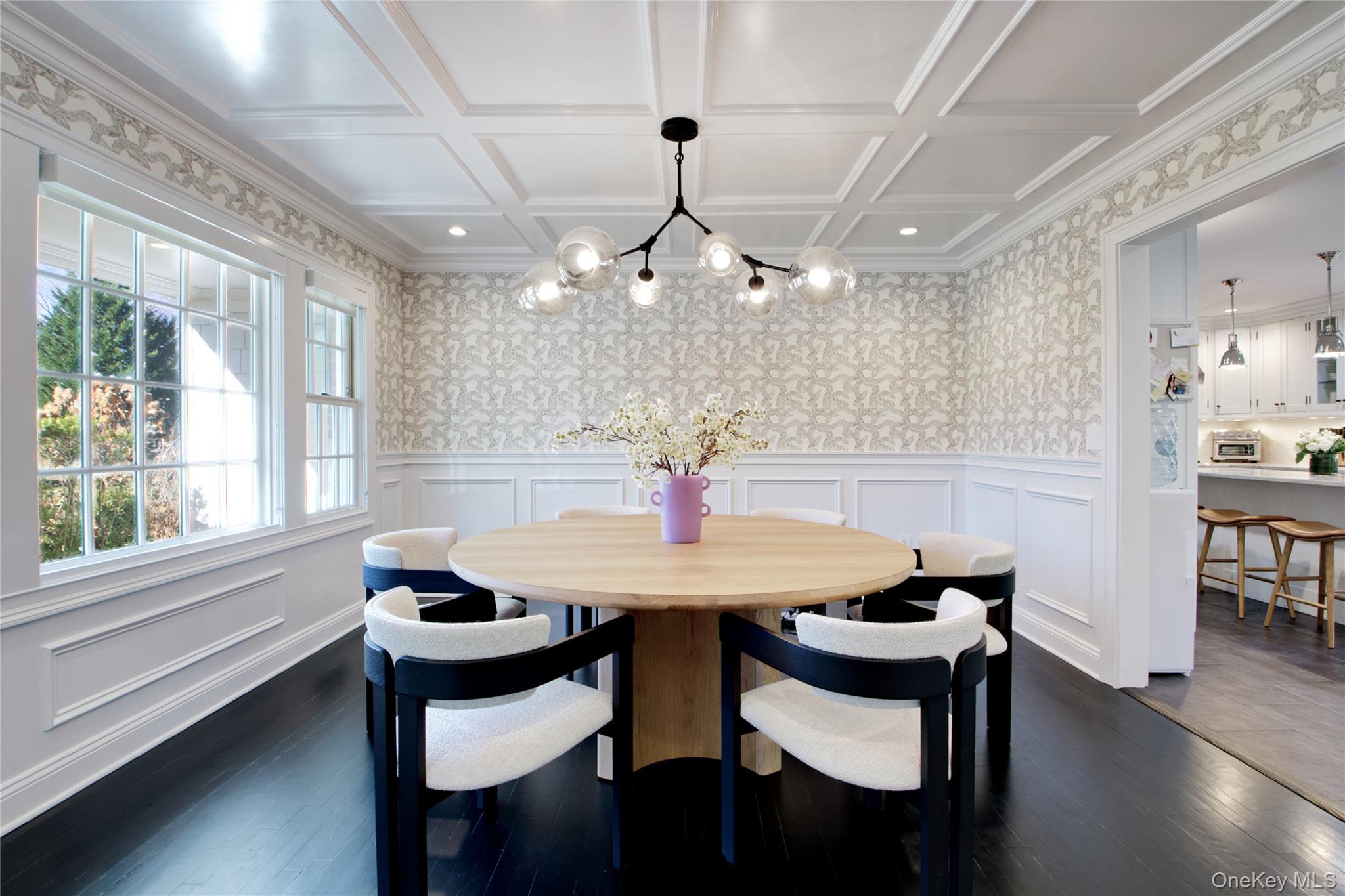 6 Flamingo Road East Hills, NY 11576 - Photo 16 of 37 a view of a dining room with furniture and wooden floor