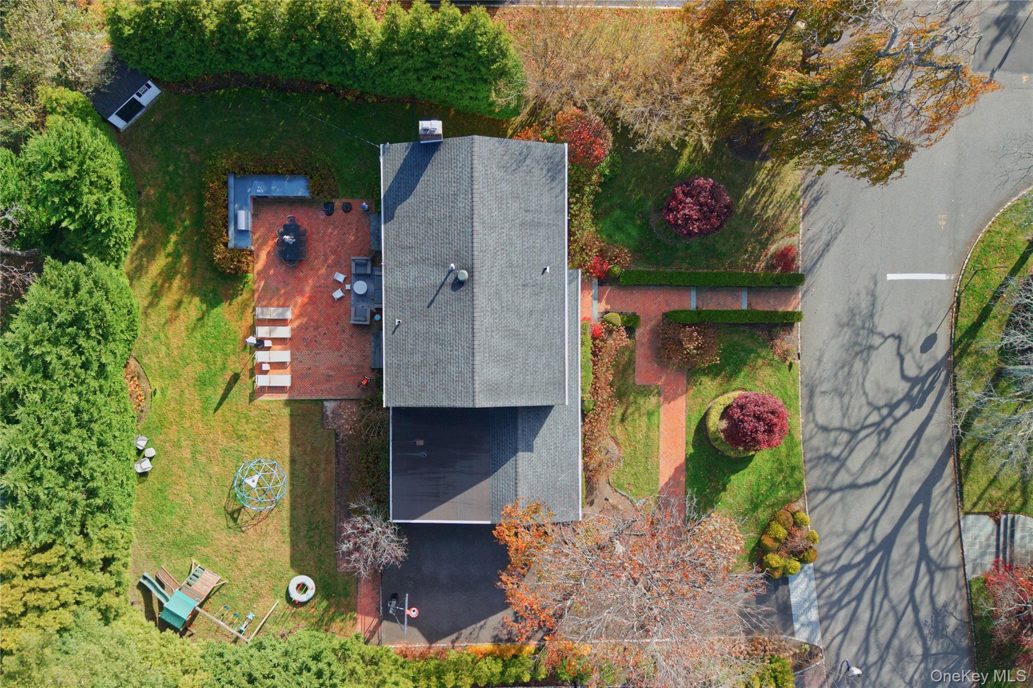 6 Flamingo Road East Hills, NY 11576 - Photo 2 of 37 an aerial view of residential house with outdoor space and swimming pool