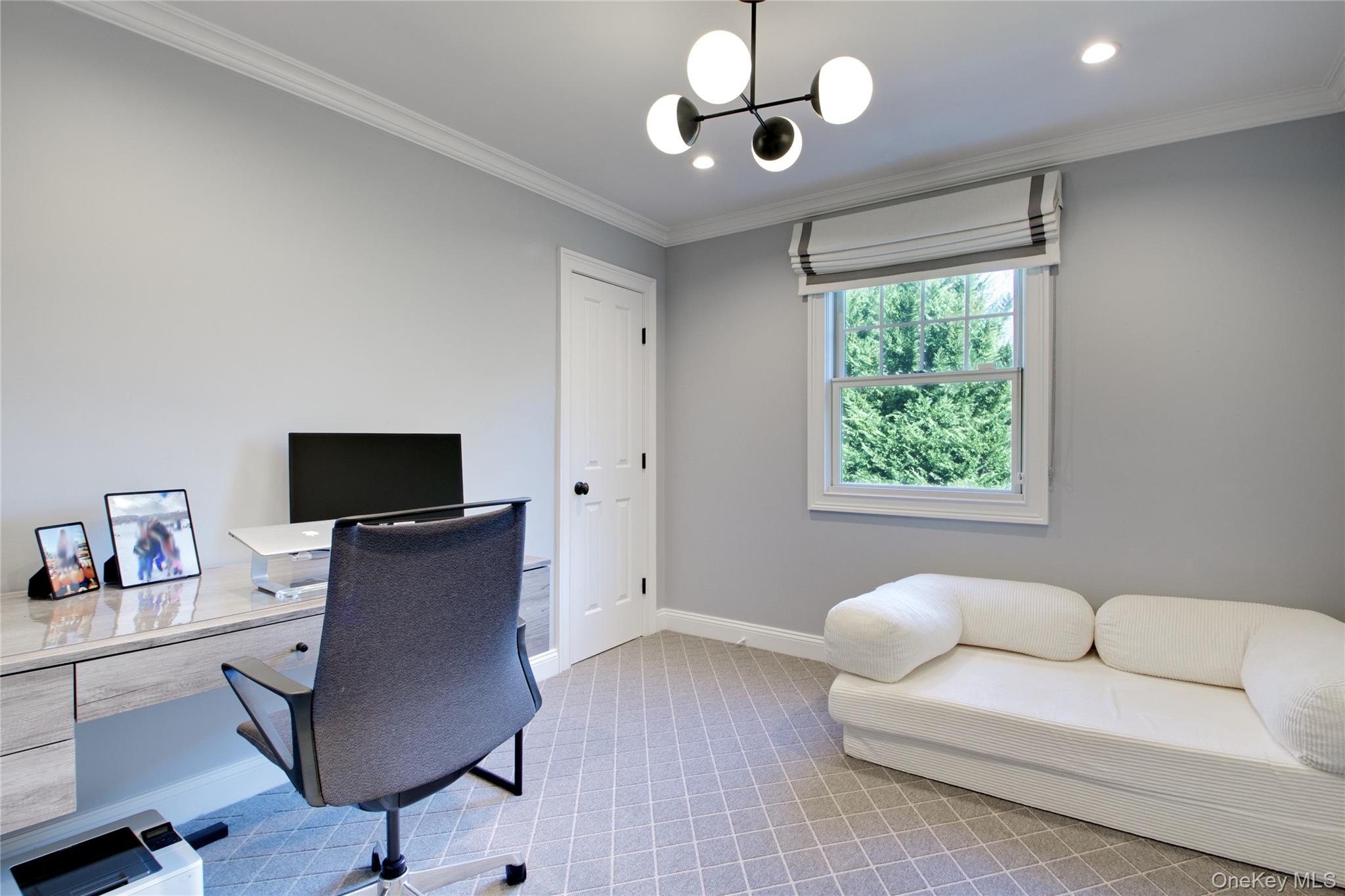 6 Flamingo Road East Hills, NY 11576 - Photo 27 of 37 a living room with furniture and a flat screen tv