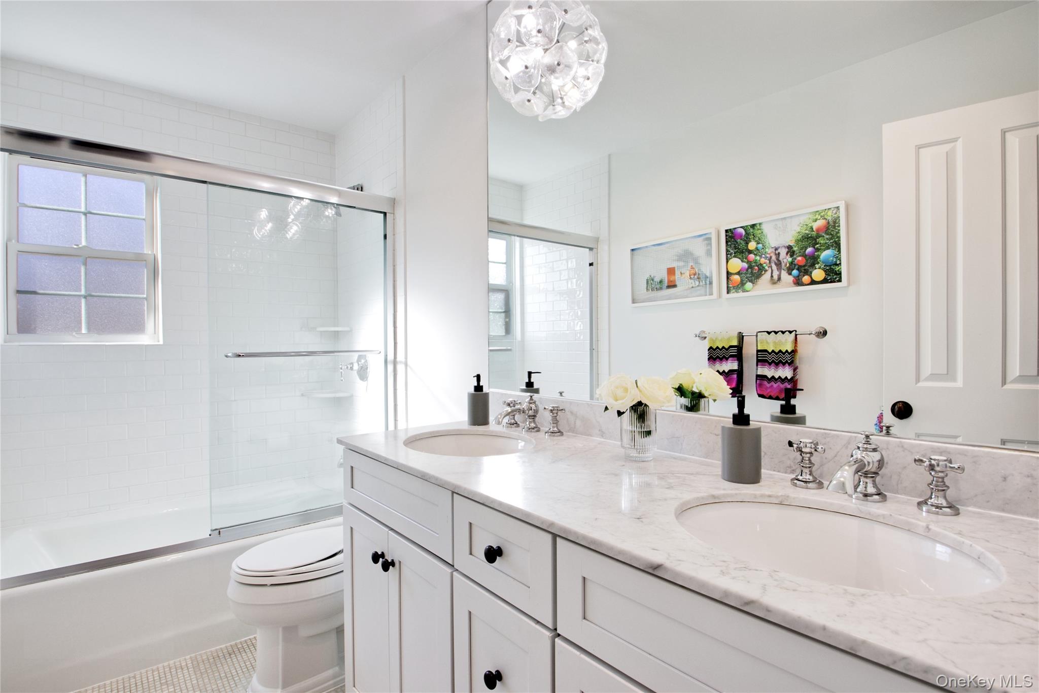 6 Flamingo Road East Hills, NY 11576 - Photo 28 of 37 a bathroom with a sink a toilet and a mirror