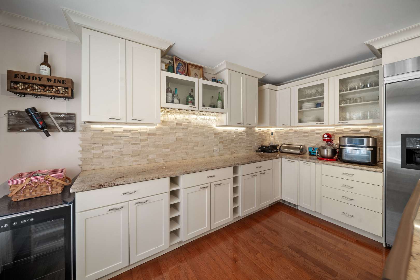 5N750 Medinah Road Medinah, IL 60157 - Photo 15 of 53 a kitchen with granite countertop white cabinets and white appliances
