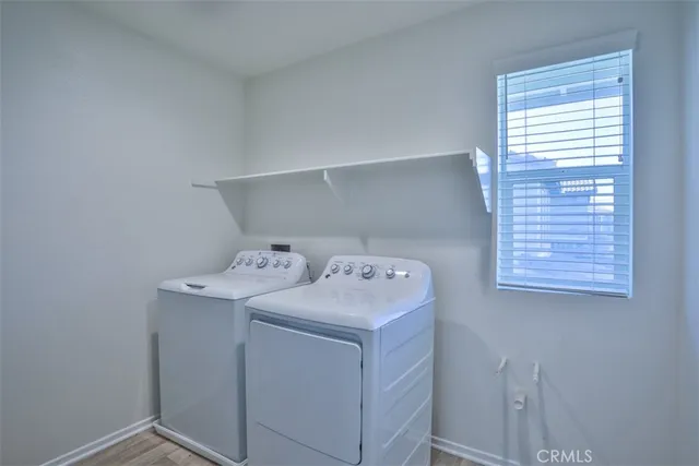 a bathroom with a sink toilet a mirror and shower