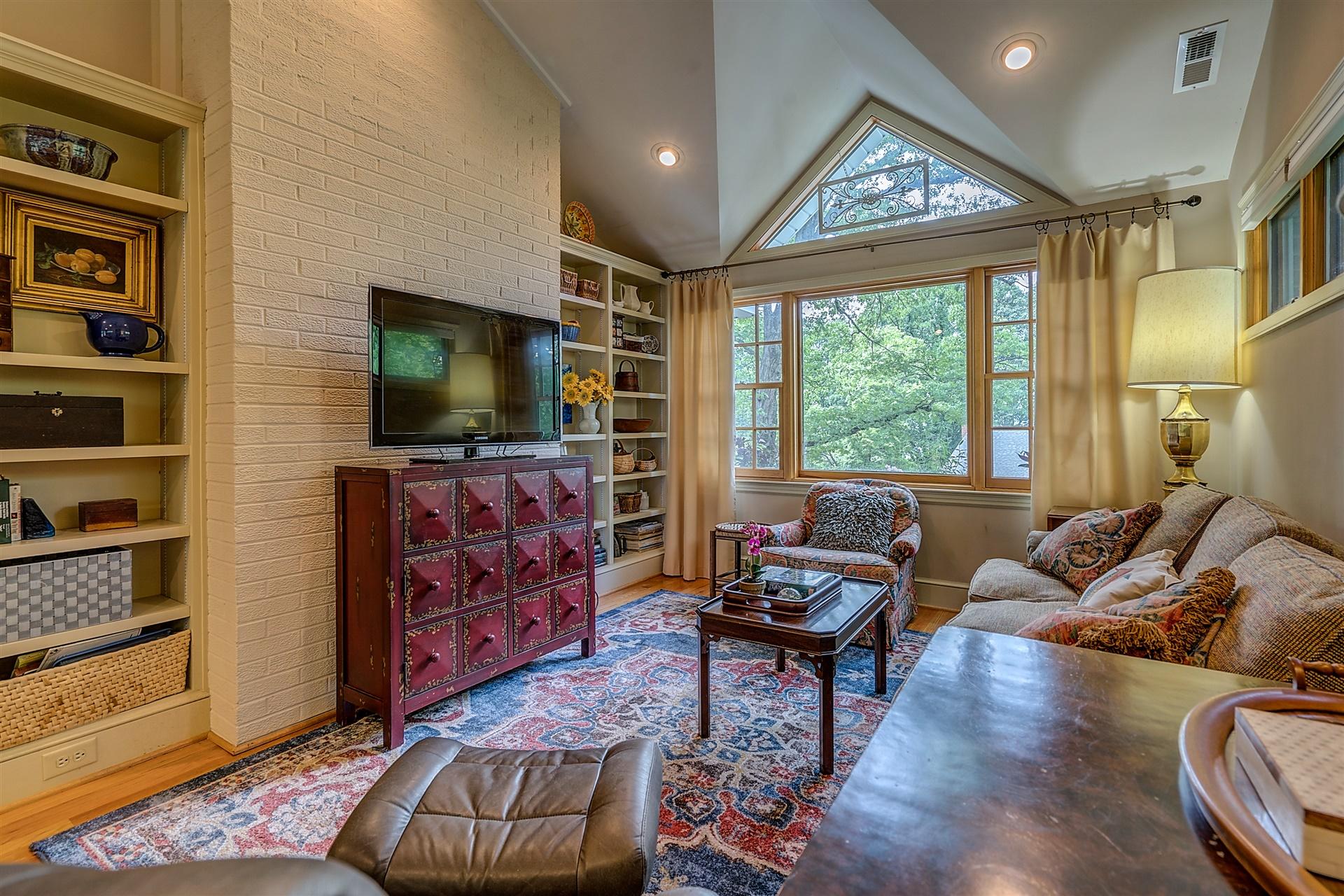 3126 Stoneridge Road Southwest Roanoke, VA 24014 - Photo 15 of 48 a living room with furniture and a flat screen tv
