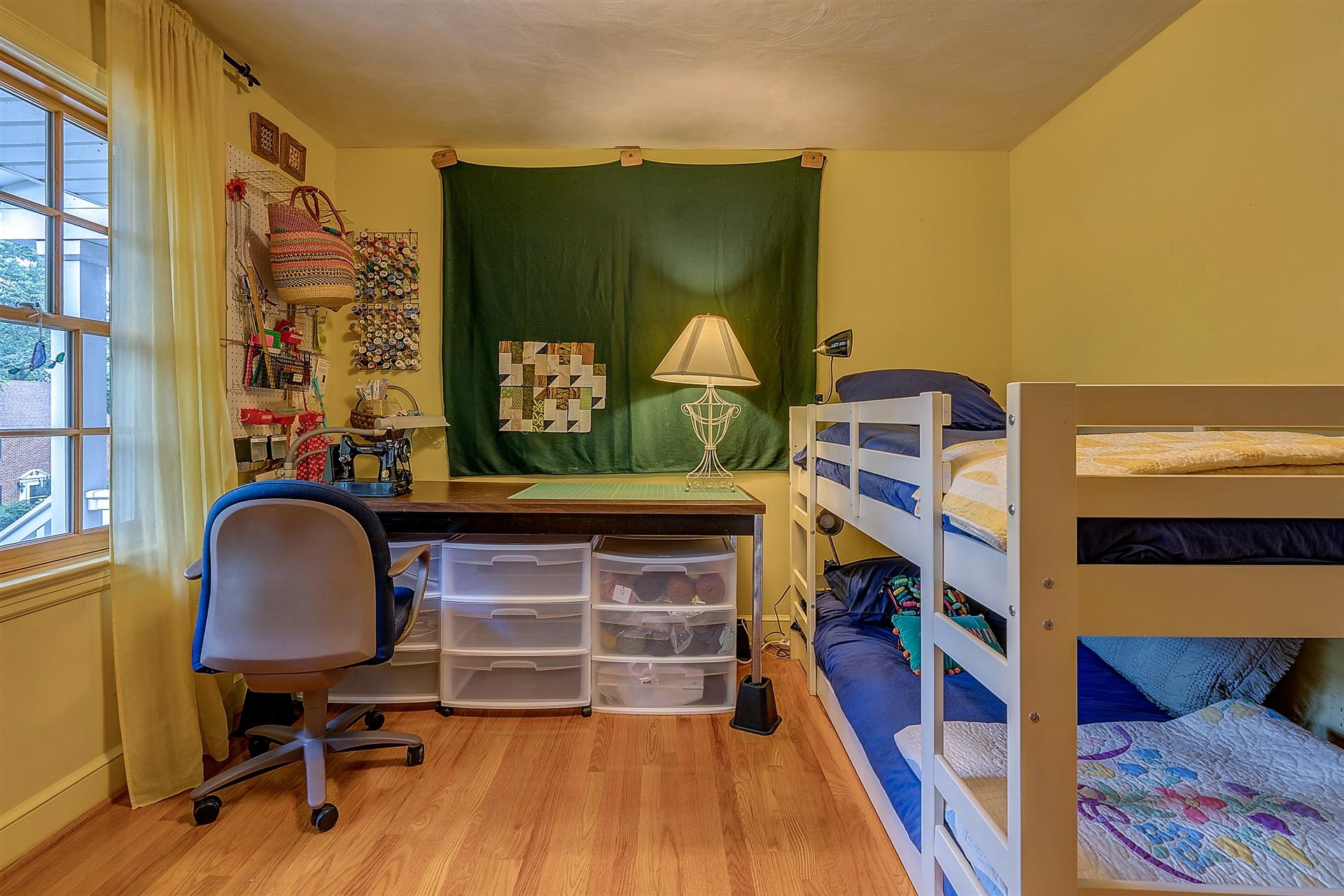3126 Stoneridge Road Southwest Roanoke, VA 24014 - Photo 23 of 48 a view of a workspace with furniture and wooden floor