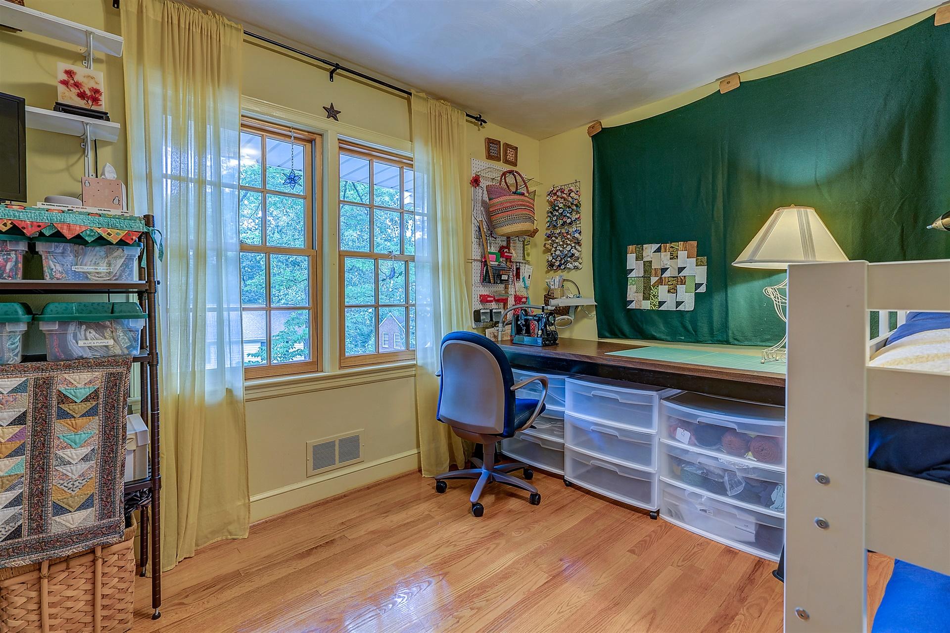 3126 Stoneridge Road Southwest Roanoke, VA 24014 - Photo 24 of 48 a view of a workspace with furniture and a window