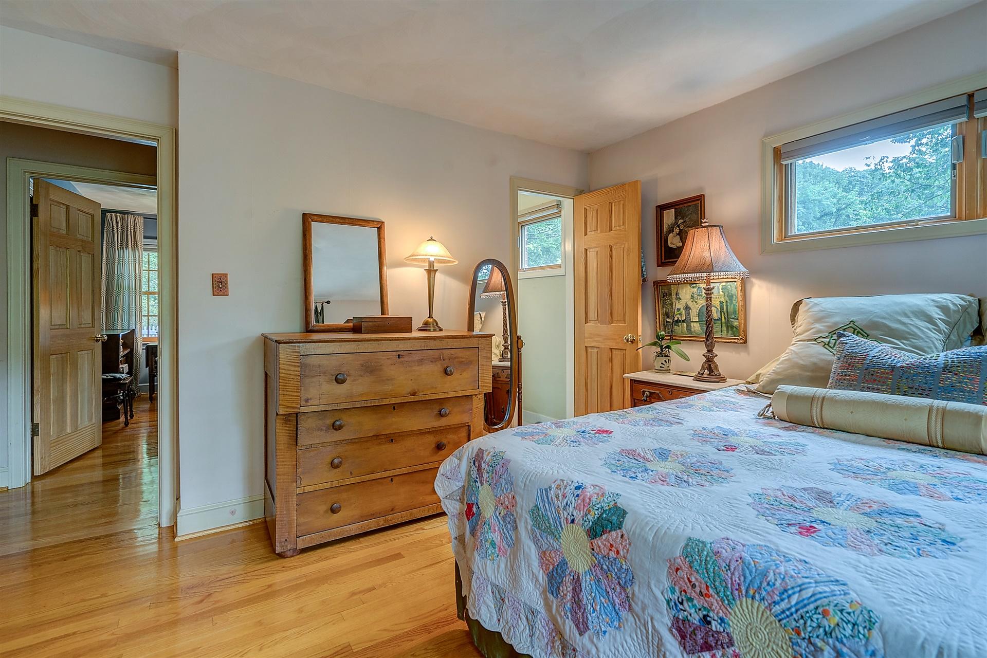 3126 Stoneridge Road Southwest Roanoke, VA 24014 - Photo 25 of 48 a bedroom with a bed and a dresser