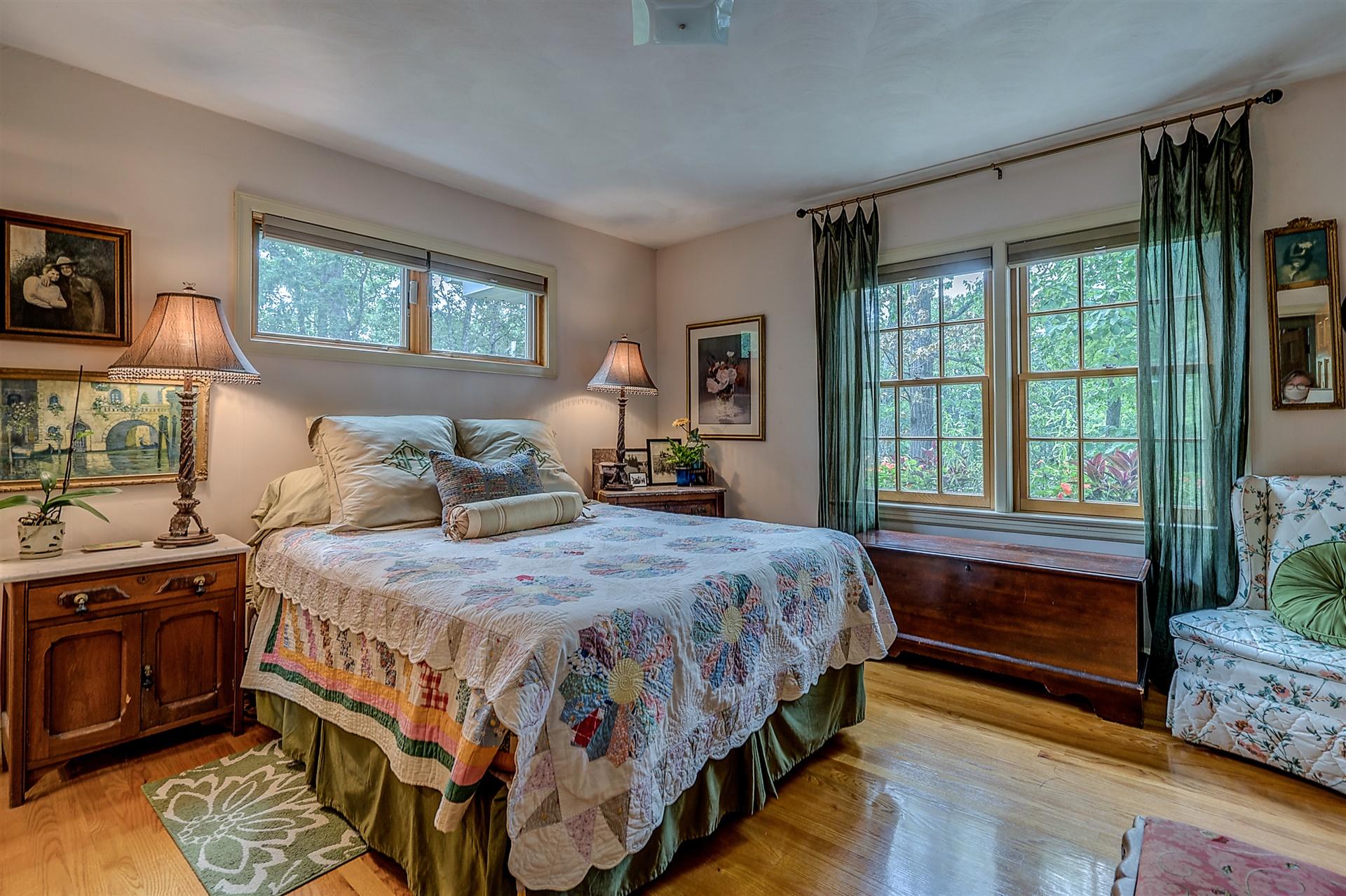 3126 Stoneridge Road Southwest Roanoke, VA 24014 - Photo 26 of 48 a bedroom with a bed a mirror and a window