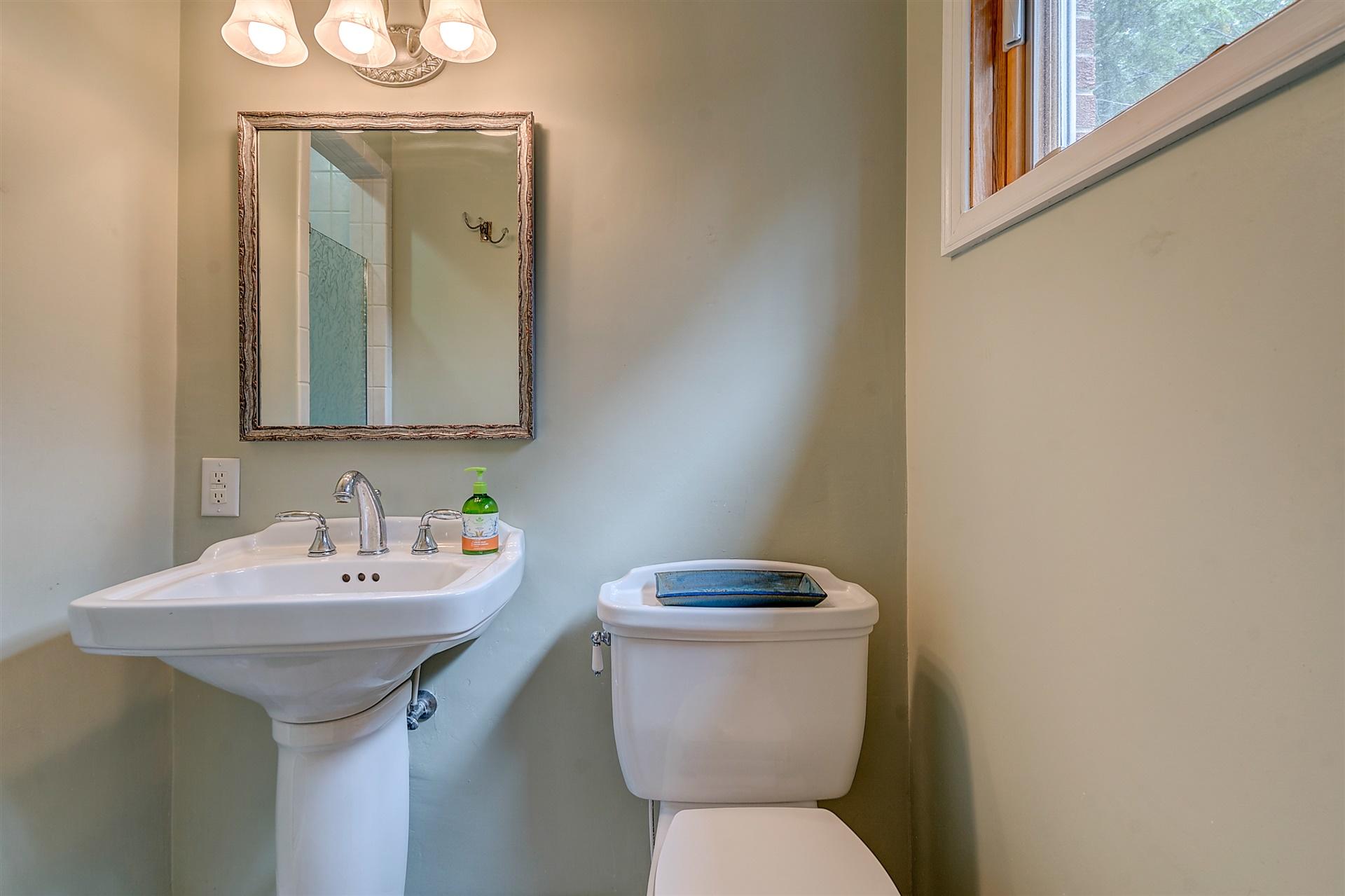 3126 Stoneridge Road Southwest Roanoke, VA 24014 - Photo 29 of 48 a bathroom with a toilet sink and mirror