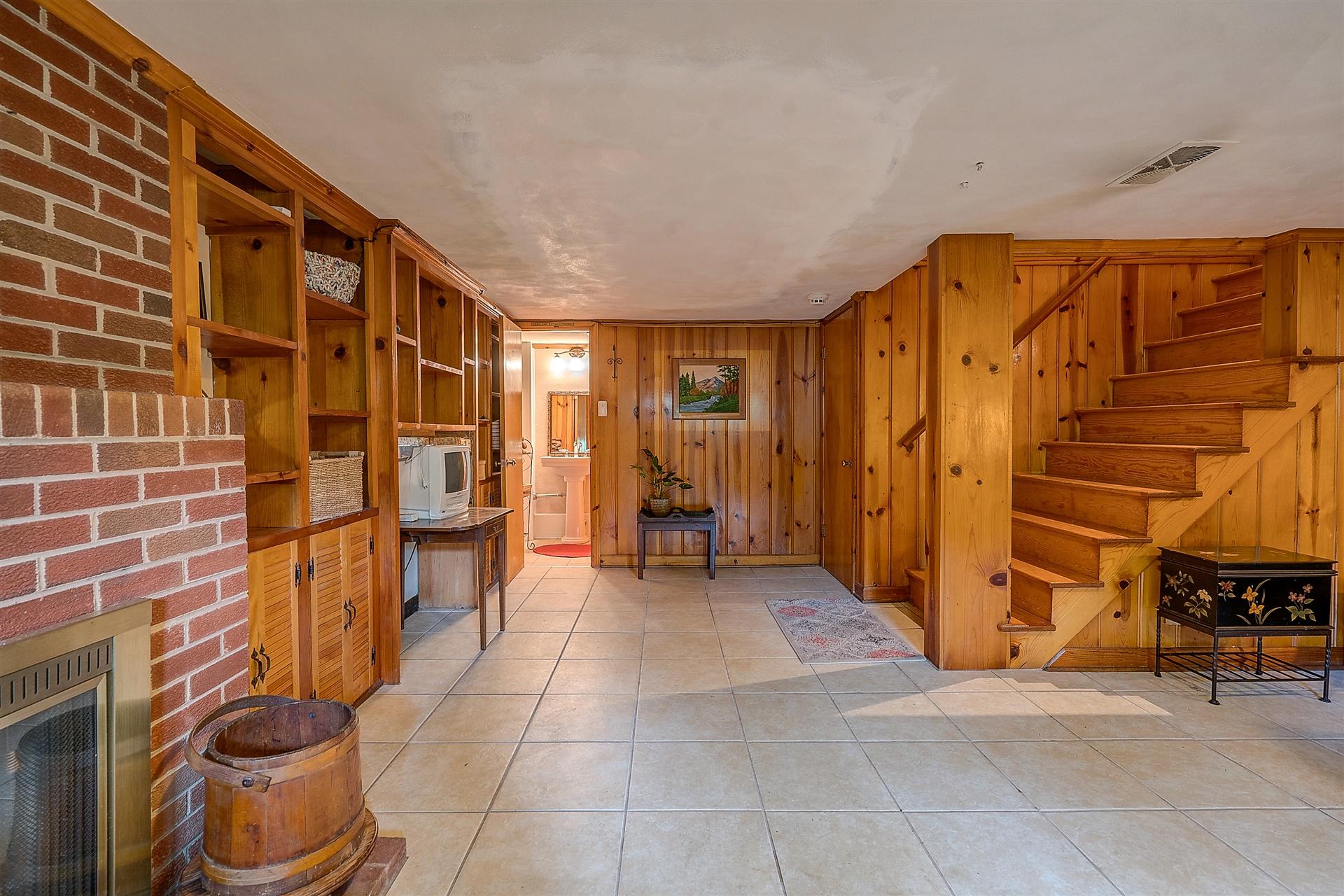 3126 Stoneridge Road Southwest Roanoke, VA 24014 - Photo 34 of 48 a view of empty room with wooden floor and fan