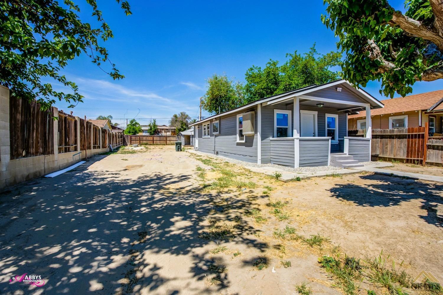 Undisclosed Address Taft, CA 93268 - Photo 2 of 30 a view of a house with a yard