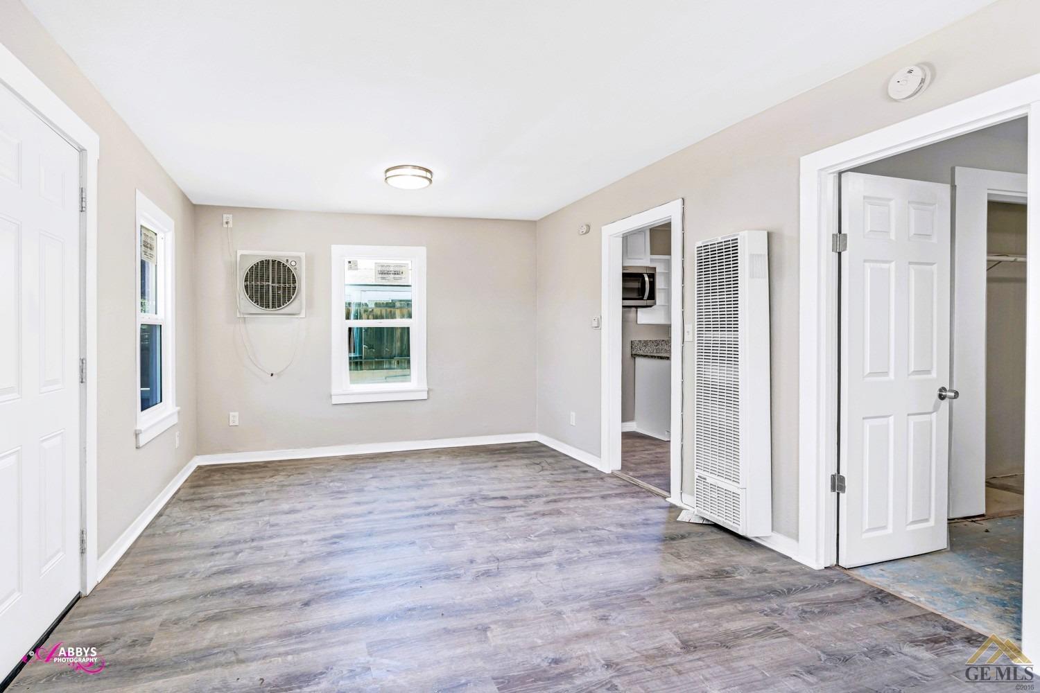 Undisclosed Address Taft, CA 93268 - Photo 6 of 30 an empty room with windows and closet