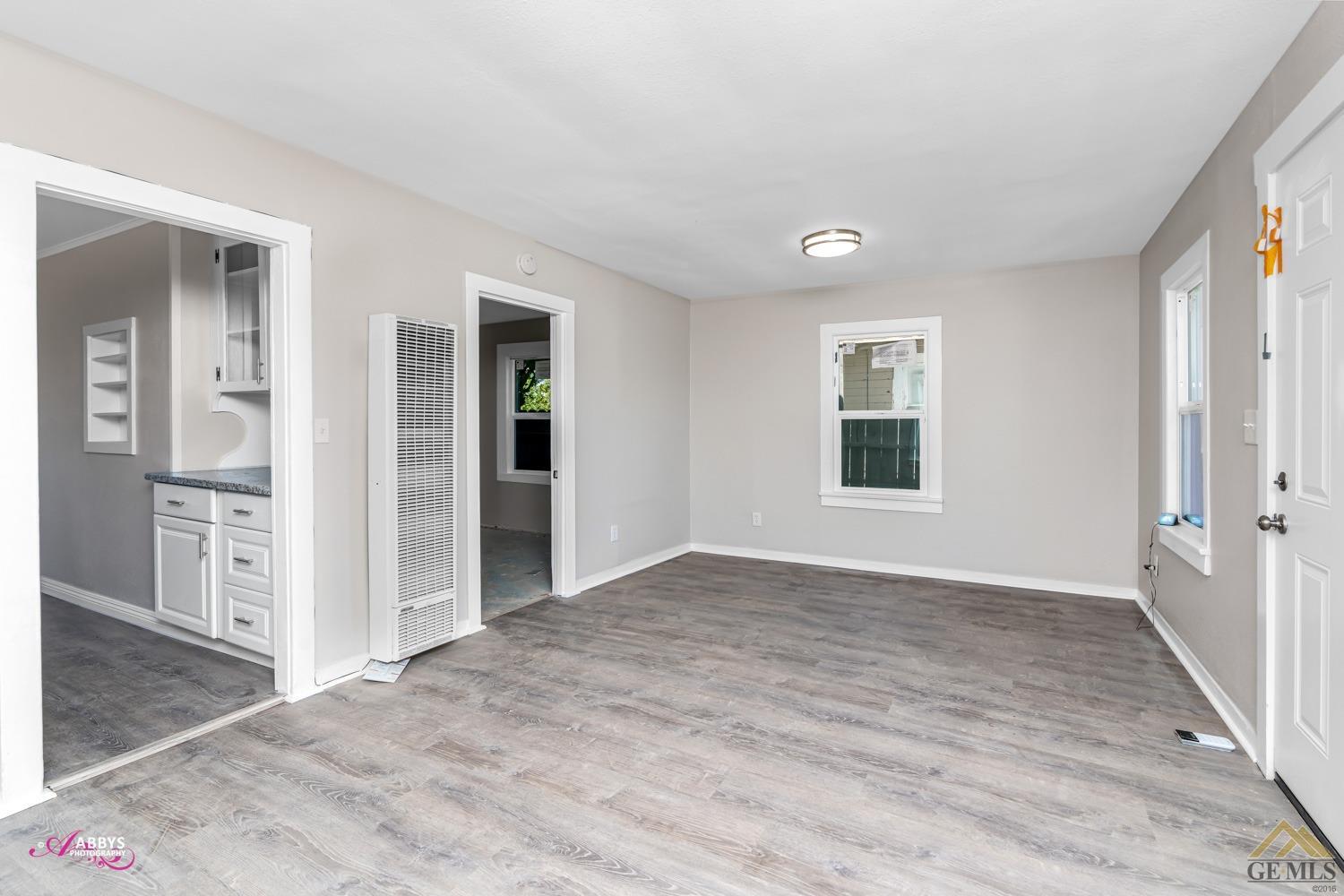 Undisclosed Address Taft, CA 93268 - Photo 9 of 30 an empty room with closet and windows