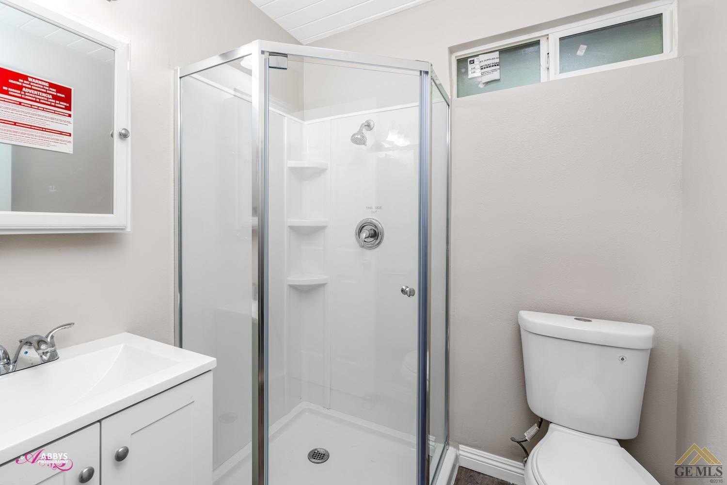 Undisclosed Address Taft, CA 93268 - Photo 10 of 30 a bathroom with a sink toilet and shower