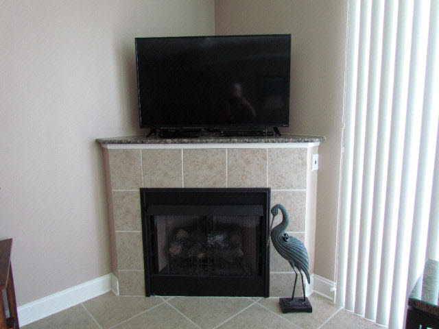 27800 Canal Road, Unit 309 Orange Beach, AL 36561 - Photo 11 of 33 gas fireplace