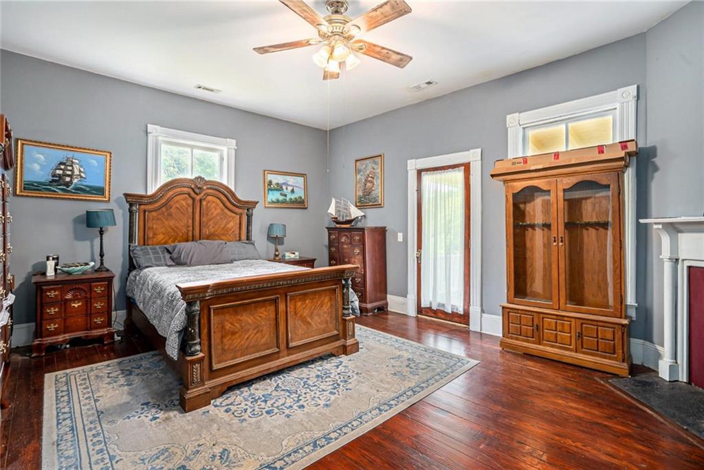 35 Old Mill Road Cedartown, GA 30125 - Photo 15 of 30 a living room with a bed furniture and paintings on the wall