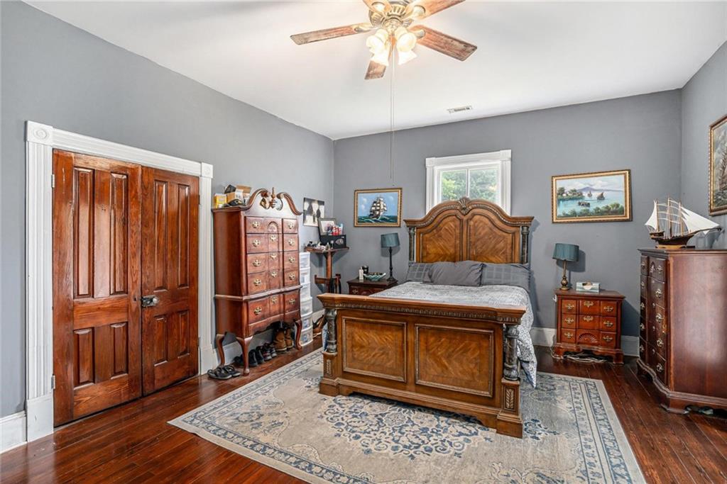 35 Old Mill Road Cedartown, GA 30125 - Photo 16 of 30 a bedroom with furniture and wooden floor