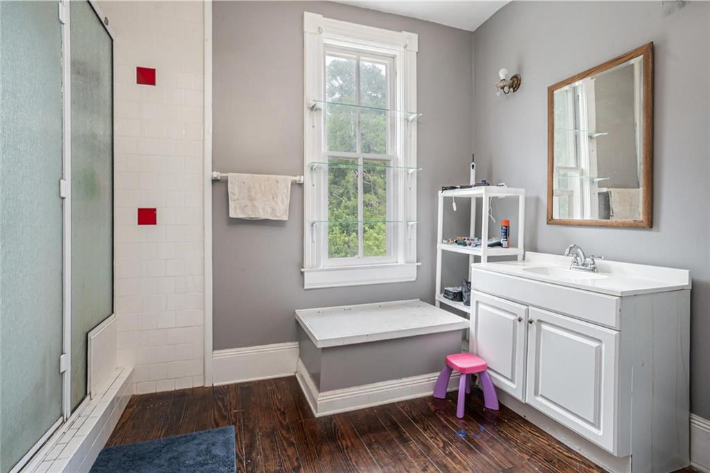 35 Old Mill Road Cedartown, GA 30125 - Photo 17 of 30 a bathroom with a sink toilet vanity and window