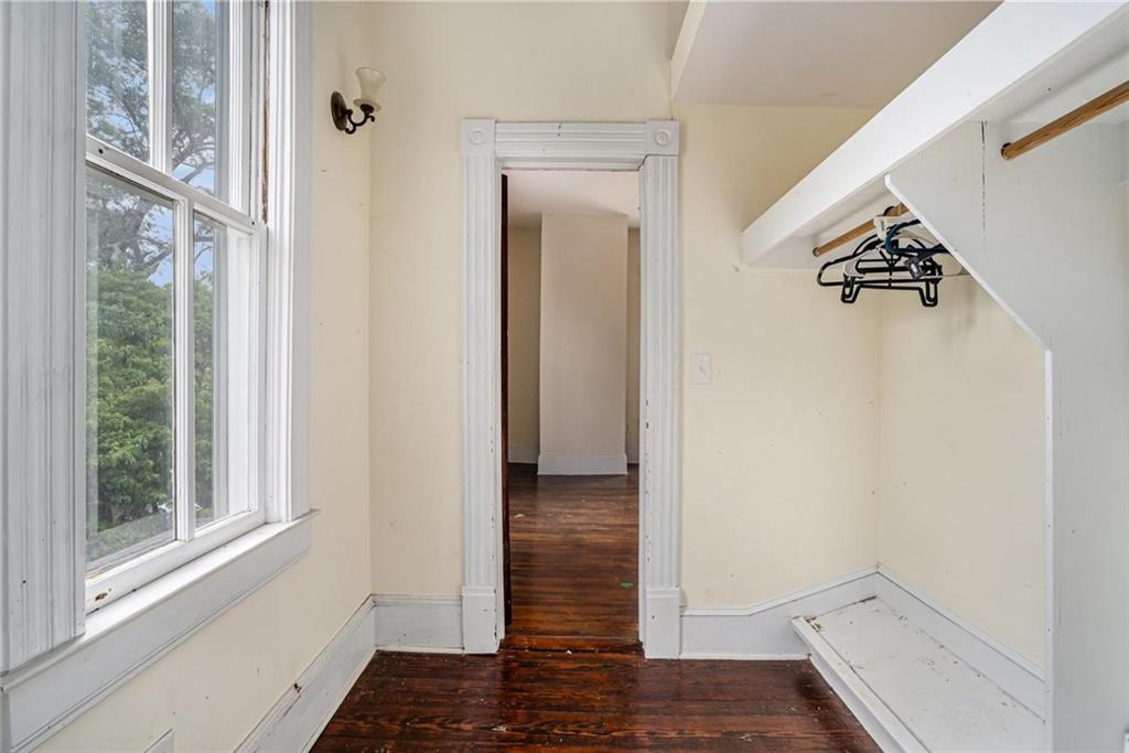 35 Old Mill Road Cedartown, GA 30125 - Photo 22 of 30 a view of a hallway with wooden floor and a bathroom