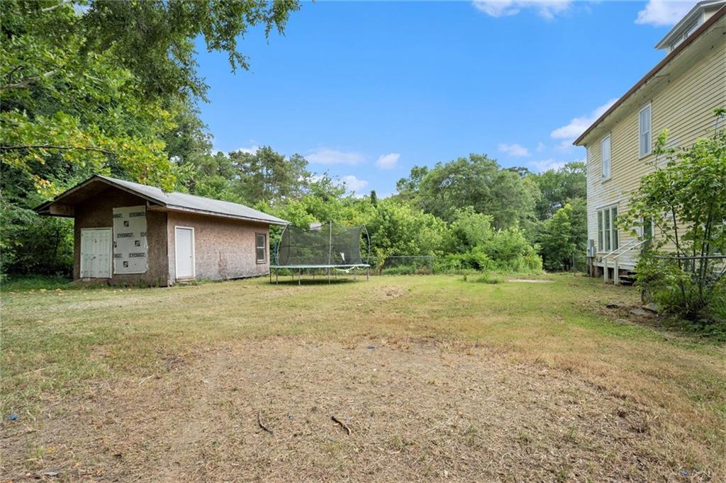 35 Old Mill Road Cedartown, GA 30125 - Photo 28 of 30 a view of a house with backyard and trees