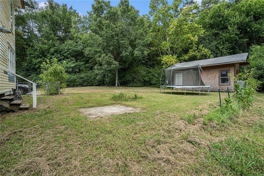35 Old Mill Road Cedartown, GA 30125 - Photo 30 of 30 a view of a backyard with large trees