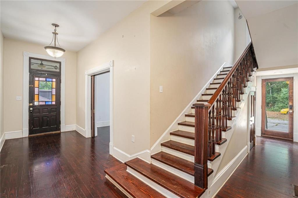 35 Old Mill Road Cedartown, GA 30125 - Photo 7 of 30 a view of an entryway with wooden floor and staircase