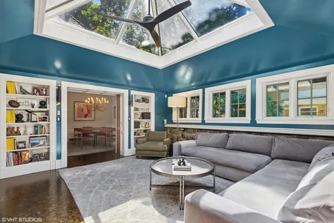 a living room with furniture and window