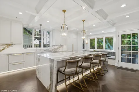 a kitchen with a stove and a sink