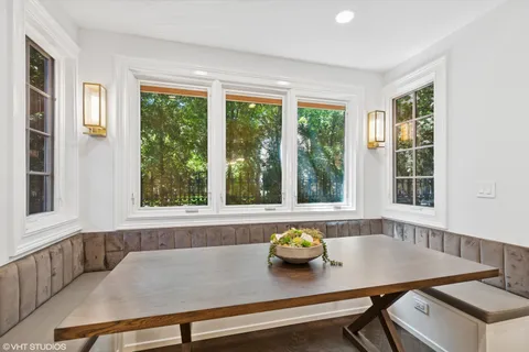 a kitchen with stainless steel appliances granite countertop a stove and a cabinet