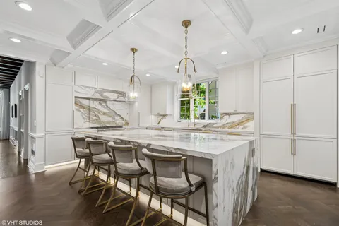 a bedroom with a bed and a flat tv screen