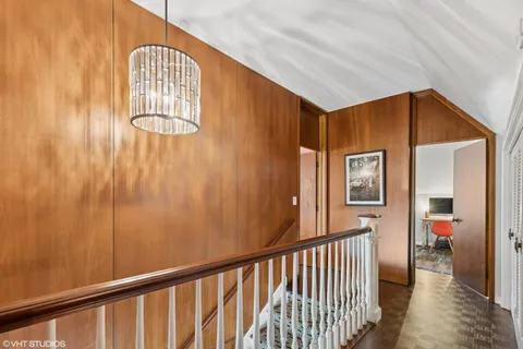 a bathroom with a sink a vanity and a shower