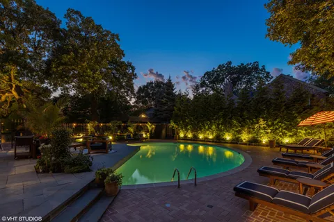 a view of a park with large trees