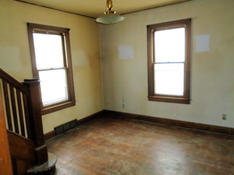 205 North 12th Street Rochelle, IL 61068 - Photo 2 of 13 a view of an empty room with a window
