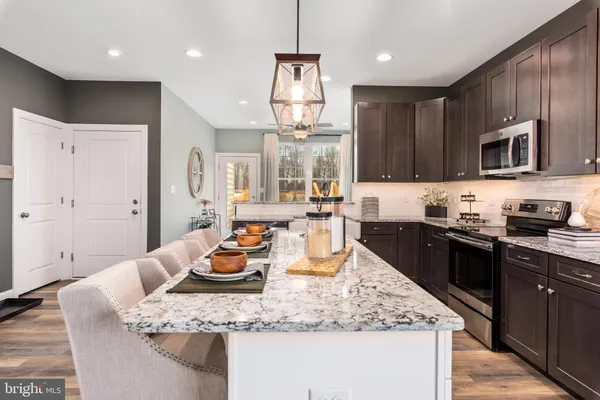 a kitchen with granite countertop lots of counter top space